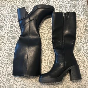 Tall black boots